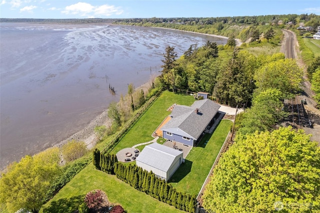 drone / aerial view with a water view