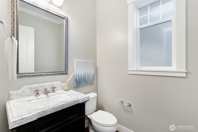 3048 39th Ave W, Seattle, WA 98199 - bathroom featuring crown molding, vanity, and toilet