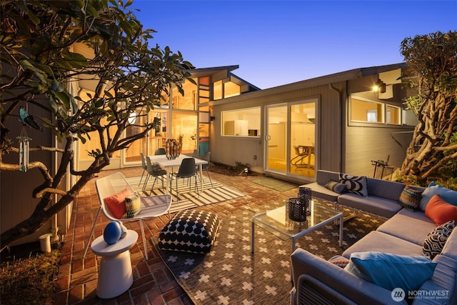 view of patio / terrace with an outdoor living space and outdoor dining area