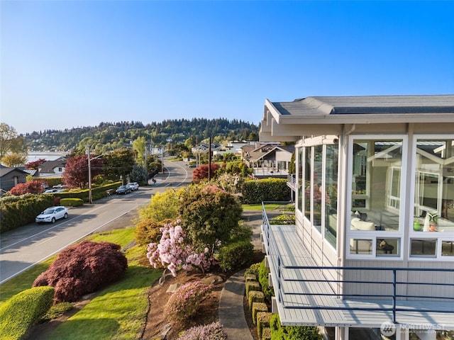 exterior space featuring a sunroom