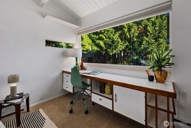 home office featuring carpet flooring and lofted ceiling