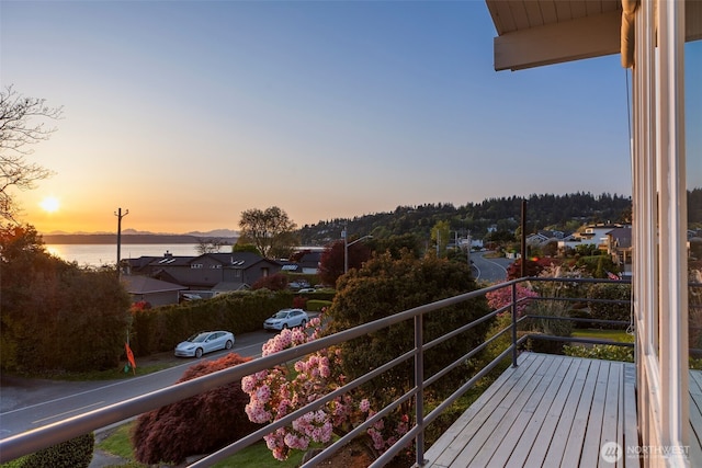 view of balcony at dusk