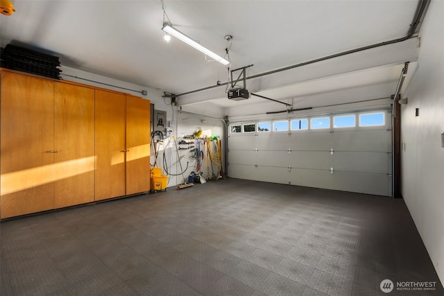 garage featuring a garage door opener