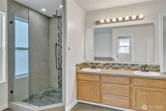 24204 SE 278th St, Maple Valley, WA 98038 - full bathroom featuring a stall shower, double vanity, tasteful backsplash, and baseboards