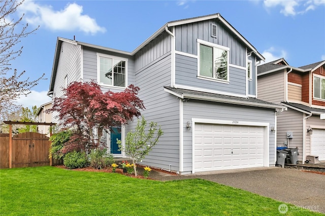 24204 SE 278th St, Maple Valley, WA 98038 - view of front of home with board and batten siding, an attached garage, asphalt driveway, a gate, and a front yard