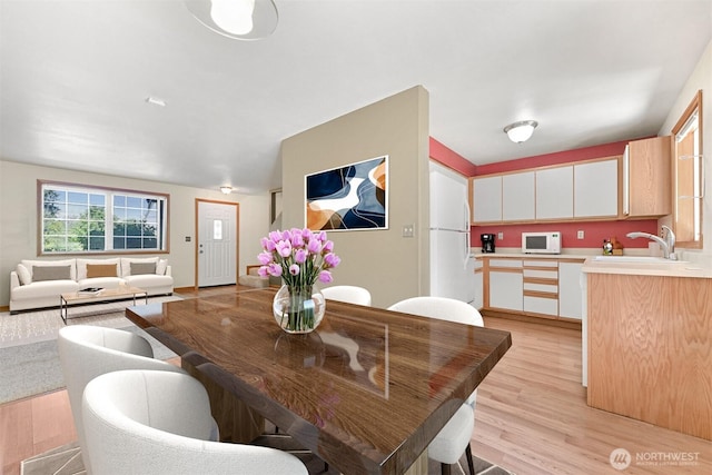 4243 Wintergreen Cir Unit 134, Bellingham, WA 98226 - dining space with light wood-style floors