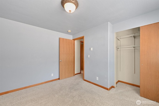 4243 Wintergreen Cir Unit 134, Bellingham, WA 98226 - unfurnished bedroom featuring baseboards, a closet, and carpet floors