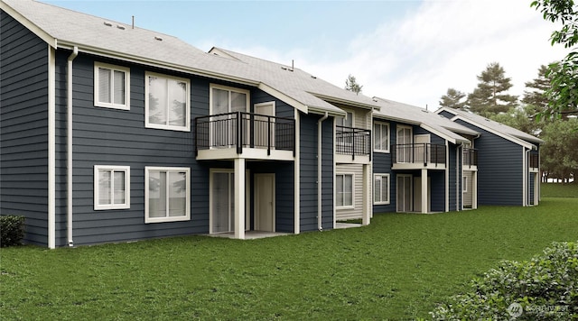 4243 Wintergreen Cir Unit 134, Bellingham, WA 98226 - rear view of property featuring a yard and a balcony