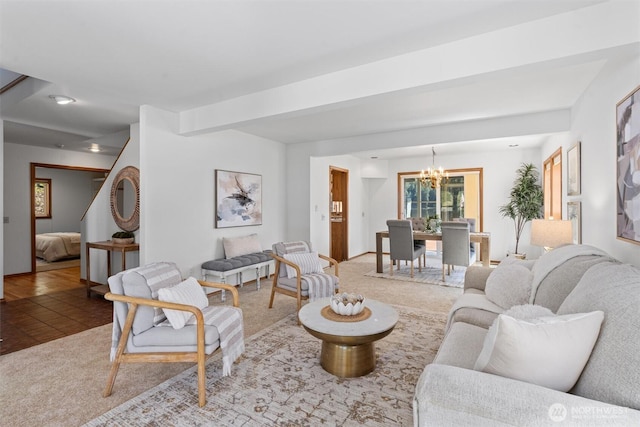 living area featuring a notable chandelier