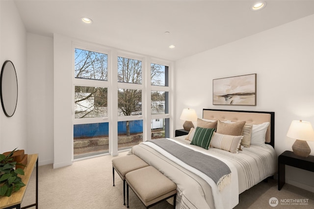 bedroom featuring recessed lighting, baseboards, and carpet floors