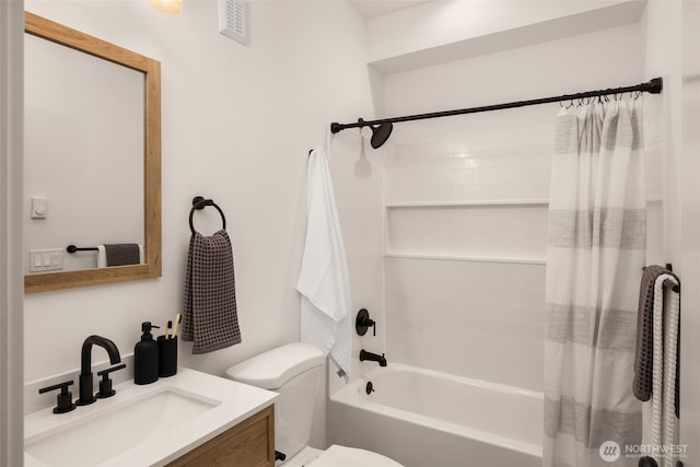 bathroom featuring shower / bathtub combination with curtain, vanity, visible vents, and toilet