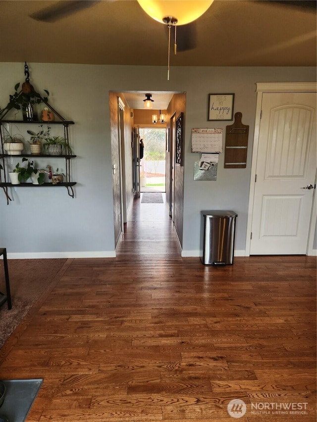 9244 Carys St SE, Yelm, WA 98597 - hallway featuring attic access, baseboards, and wood finished floors