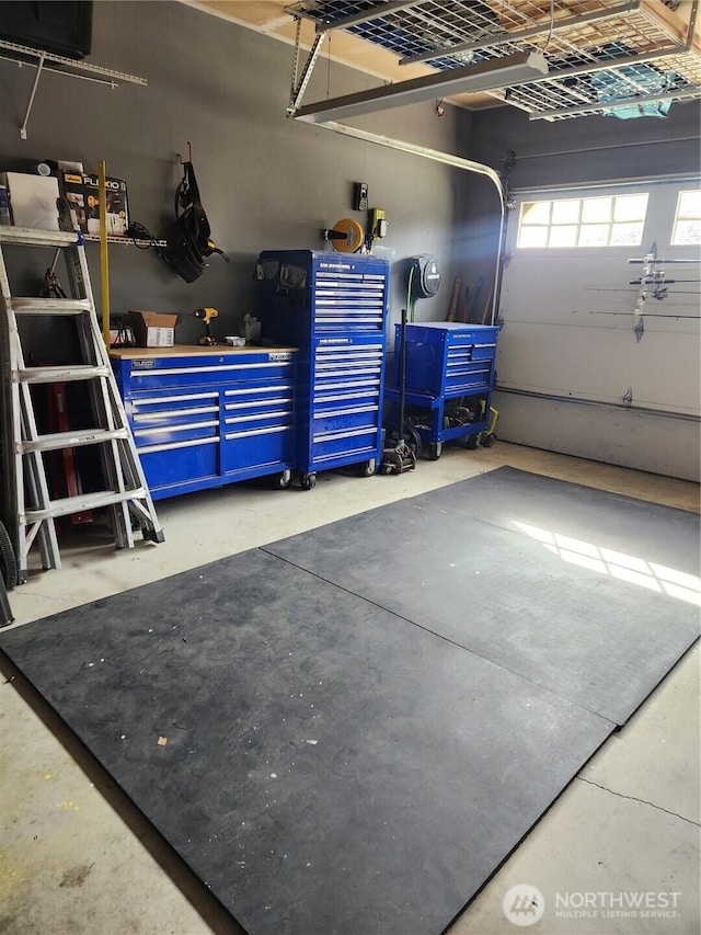 9244 Carys St SE, Yelm, WA 98597 - garage with a workshop area