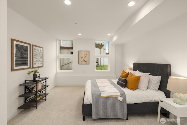 carpeted bedroom with baseboards and recessed lighting