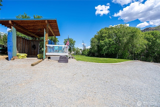 876 1st St, Chelan Falls, WA 98817 - view of grassy yard featuring a deck