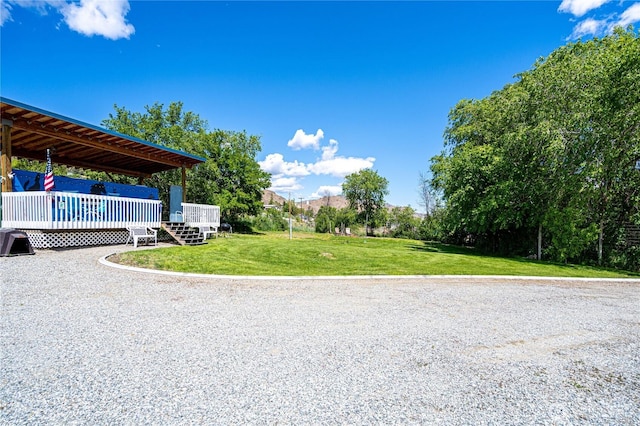 876 1st St, Chelan Falls, WA 98817 - view of grassy yard featuring a deck