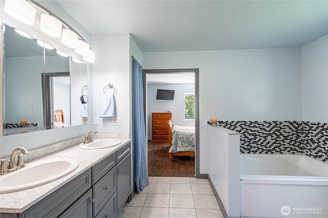 876 1st St, Chelan Falls, WA 98817 - ensuite bathroom featuring double vanity and a bath