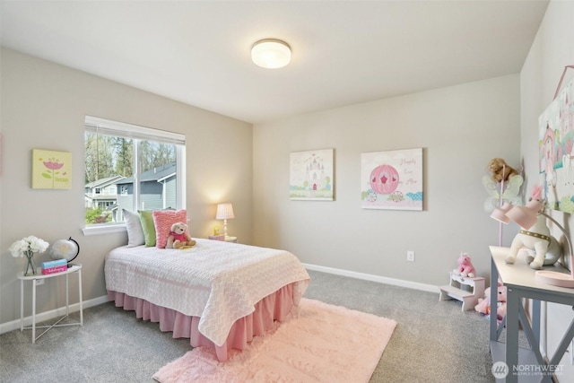 bedroom with baseboards and carpet flooring