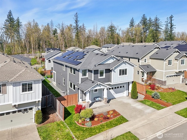 drone / aerial view with a residential view