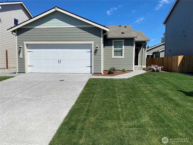 8513 13th Ave E, Tacoma, WA 98445 - ranch-style home with a garage, driveway, and a shingled roof
