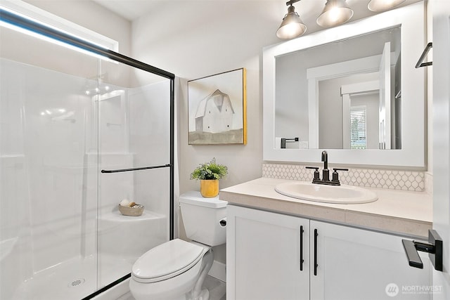 14232 SE 284th Pl, Kent, WA 98042 - full bath with a shower stall, decorative backsplash, toilet, and vanity