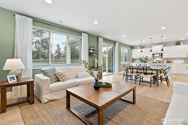 14232 SE 284th Pl, Kent, WA 98042 - living area featuring light wood-style floors, visible vents, and recessed lighting