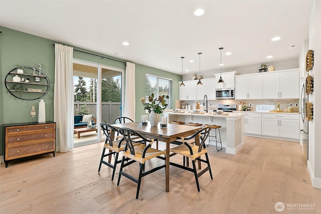 14232 SE 284th Pl, Kent, WA 98042 - dining room with light wood-style floors, visible vents, and recessed lighting
