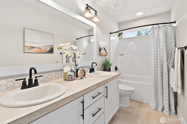 14232 SE 284th Pl, Kent, WA 98042 - bathroom with toilet, a sink, visible vents, and double vanity
