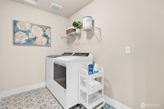14232 SE 284th Pl, Kent, WA 98042 - clothes washing area featuring washer and clothes dryer, tile patterned floors, laundry area, baseboards, and visible vents