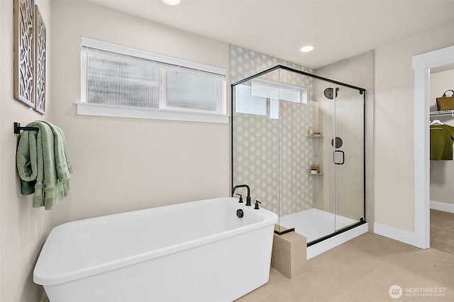 14232 SE 284th Pl, Kent, WA 98042 - full bathroom featuring recessed lighting, a freestanding tub, tile patterned floors, and a stall shower