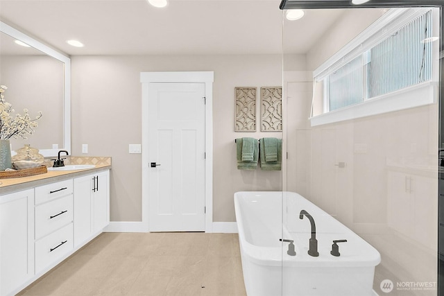 14232 SE 284th Pl, Kent, WA 98042 - full bath featuring baseboards, a freestanding tub, recessed lighting, and vanity