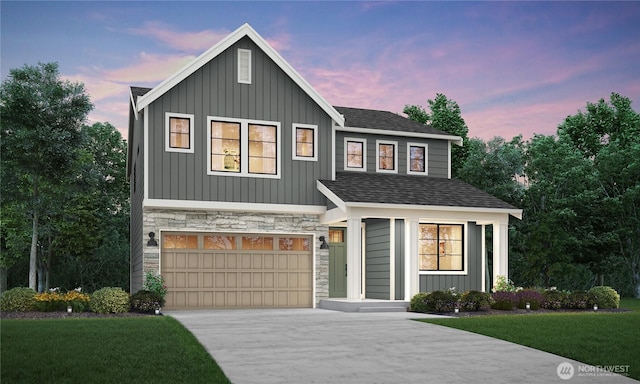 14232 SE 284th Pl, Kent, WA 98042 - view of front facade with driveway, stone siding, an attached garage, a lawn, and board and batten siding