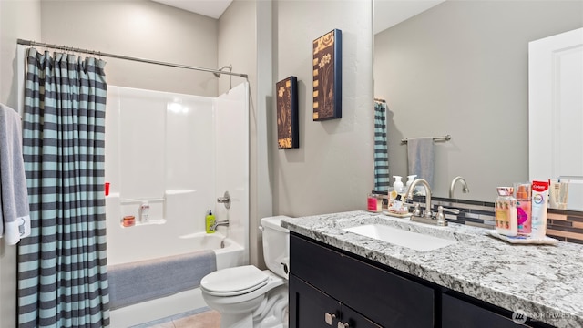 131 NW Blalock Dr, College Place, WA 99324 - bathroom featuring shower / bath combo, toilet, and vanity