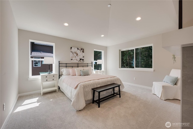bedroom featuring light carpet, baseboards, and recessed lighting