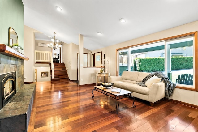 24264 133rd Ave SE, Kent, WA 98042 - living area featuring vaulted ceiling, hardwood / wood-style floors, and baseboards
