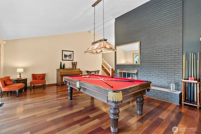 24264 133rd Ave SE, Kent, WA 98042 - game room featuring vaulted ceiling with beams, baseboards, brick wall, wood finished floors, and billiards