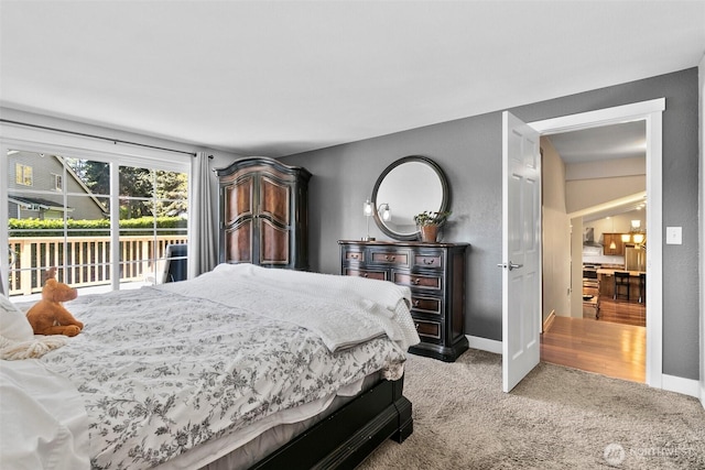 24264 133rd Ave SE, Kent, WA 98042 - carpeted bedroom featuring baseboards and access to exterior
