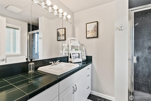 24264 133rd Ave SE, Kent, WA 98042 - bathroom with baseboards, vanity, and a stall shower