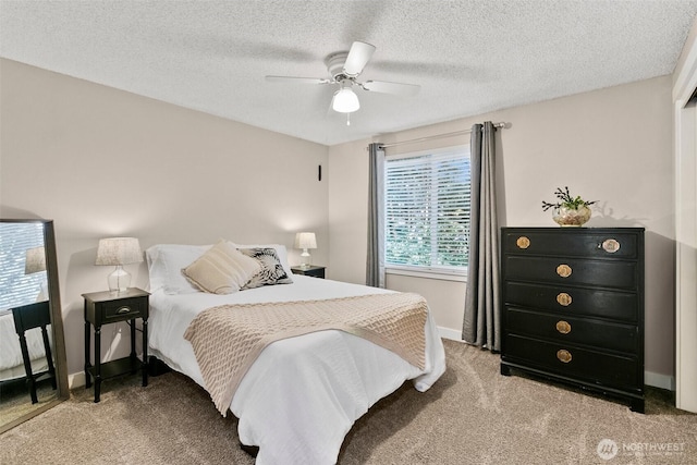 24264 133rd Ave SE, Kent, WA 98042 - carpeted bedroom with baseboards, a ceiling fan, and a textured ceiling