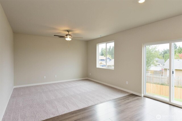 2306 158th Street Ct E, Tacoma, WA 98445 - empty room featuring baseboards, a ceiling fan, carpet, recessed lighting, and wood finished floors
