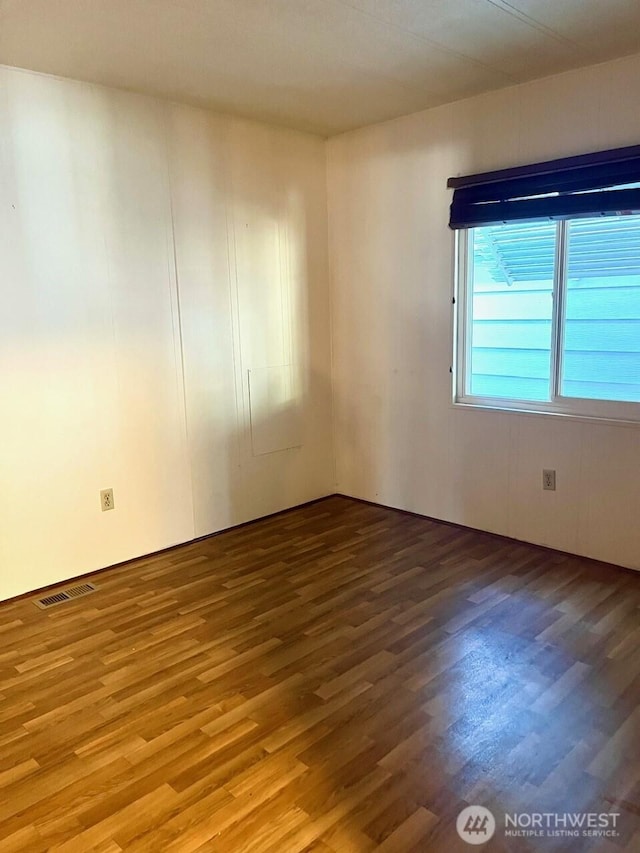 815 124th St SW Unit 144, Everett, WA 98204 - spare room featuring wood finished floors and visible vents