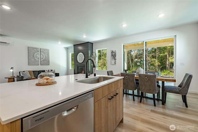709 E 5th St, Nooksack, WA 98276 - kitchen with recessed lighting, a wall unit AC, a sink, and dishwasher