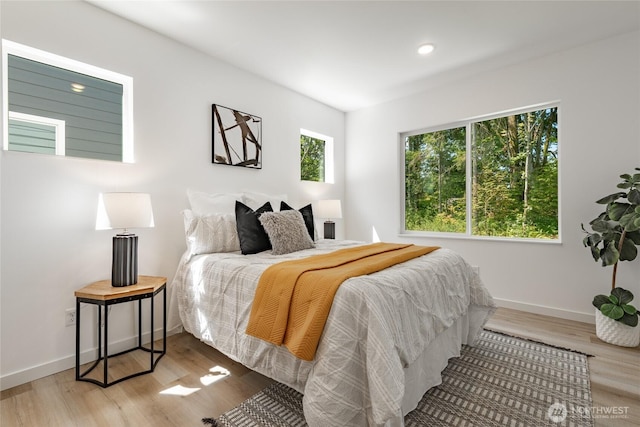 709 E 5th St, Nooksack, WA 98276 - bedroom with recessed lighting, baseboards, and wood finished floors