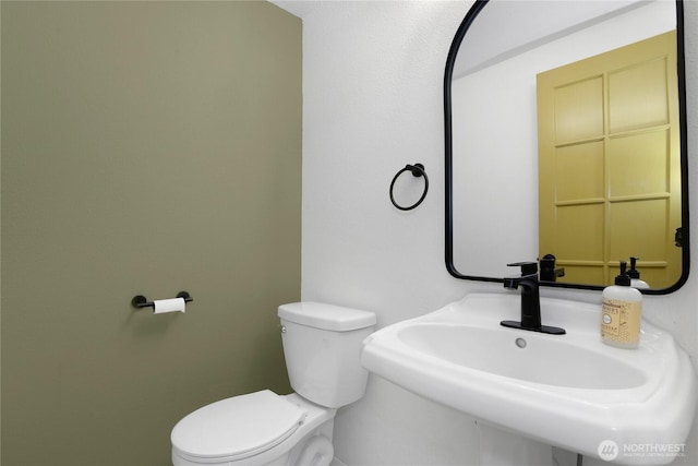 5350 Aspinwall Ct NW, Olympia, WA 98502 - half bathroom with a sink and toilet