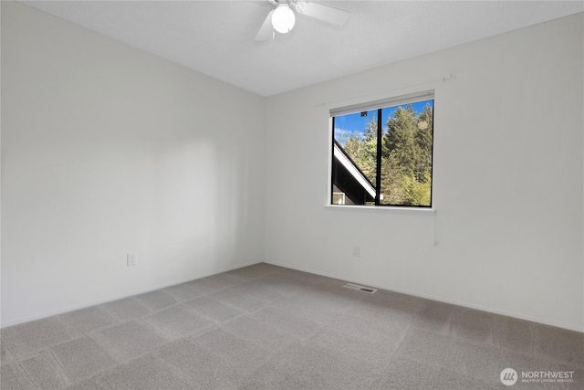 5350 Aspinwall Ct NW, Olympia, WA 98502 - spare room featuring light carpet and ceiling fan