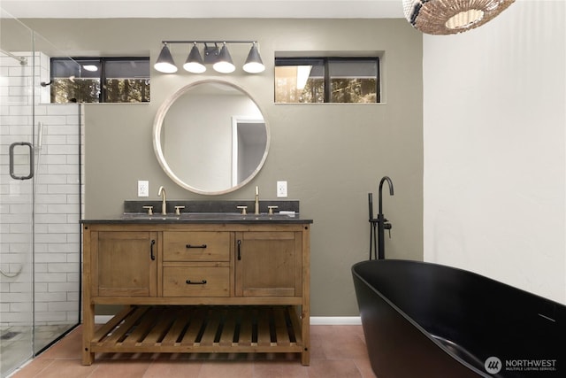 5350 Aspinwall Ct NW, Olympia, WA 98502 - full bathroom with a shower stall, a freestanding tub, tile patterned floors, and double vanity