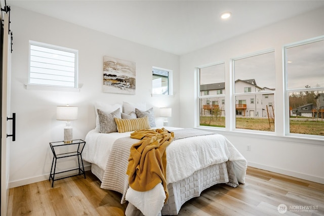 710 E 5th St, Nooksack, WA 98276 - bedroom featuring recessed lighting, baseboards, and light wood-type flooring