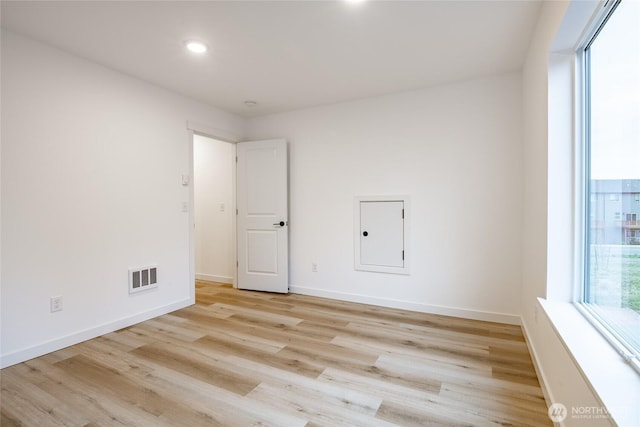 710 E 5th St, Nooksack, WA 98276 - empty room featuring recessed lighting, baseboards, visible vents, and light wood-style floors