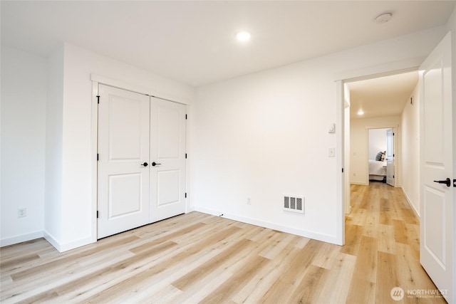 710 E 5th St, Nooksack, WA 98276 - unfurnished bedroom with visible vents, recessed lighting, light wood finished floors, and baseboards