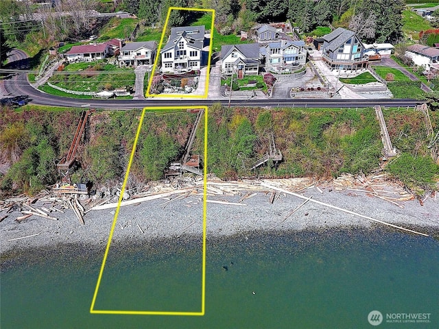 aerial view with a residential view and a water view
